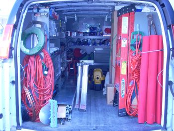 Warehouse on Wheels, an inside picture of the van with material to do most jobs in a home.